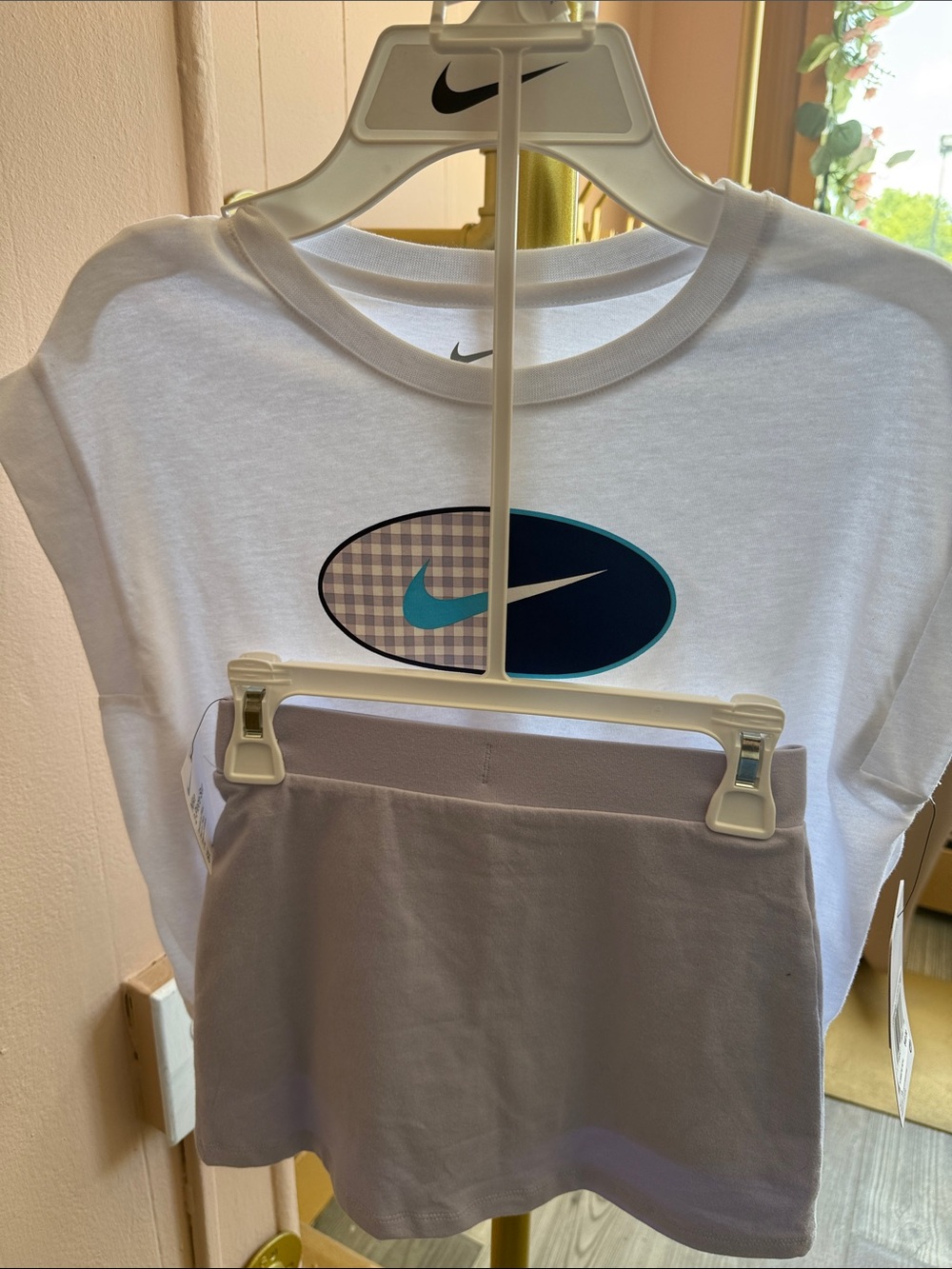 Nike White Kids Tee with Teal and Navy Logo